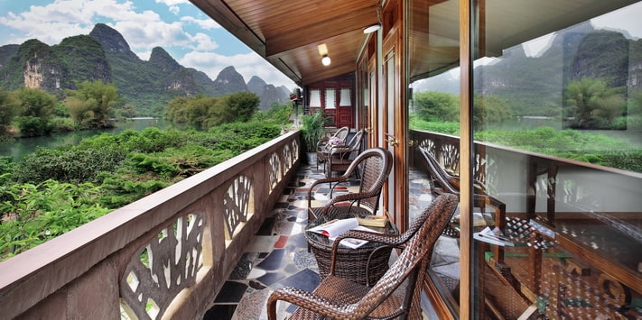 Yangshuo Mountain Retreat family private balcony overlooking the Yulong River.
