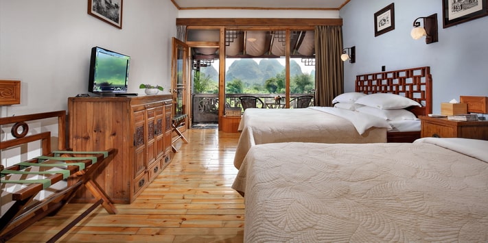 Yangshuo Mountain Retreat family private balcony overlooking the Yulong River.