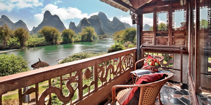 Yangshuo Mountain Retreat family private balcony overlooking the Yulong River.