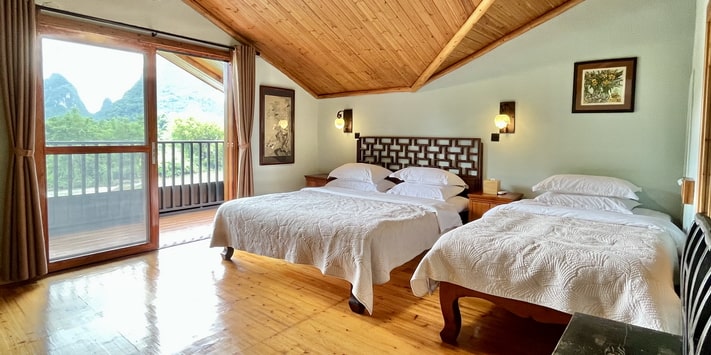 This river view room is a favorite of returning guests to Yangshuo Mountain Retreat.