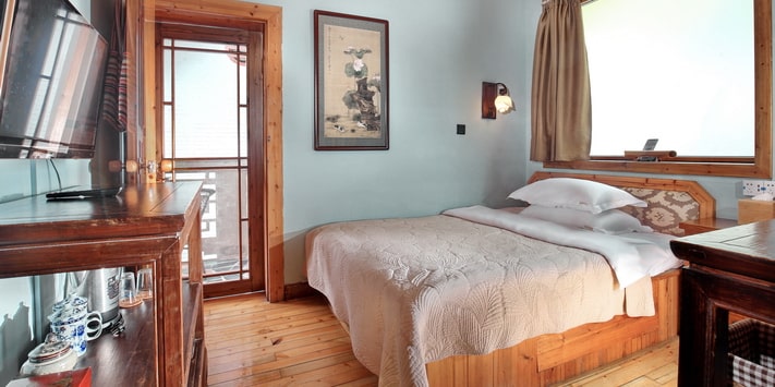 Yangshuo Mountain Retreat single side balcony room is perfect for single travellers on a budget.