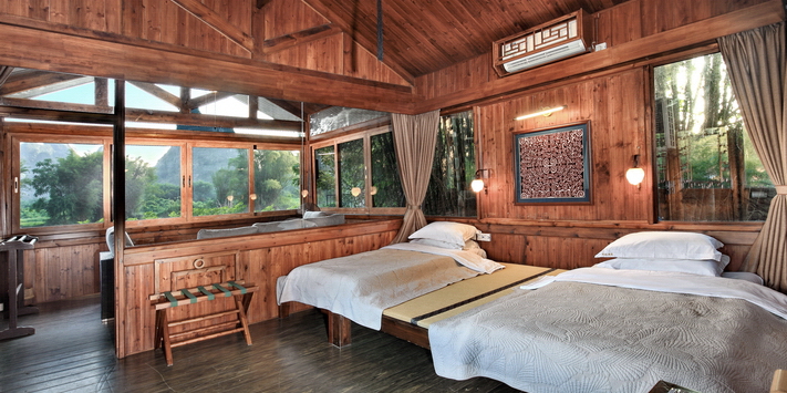 This is the largest room at Mountain Retreat , two bathrooms, seating on the terrace for up to 8 people and spectacular views, all in a separate private building.