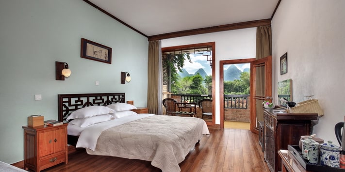 Yangshuo Mountain Retreat Yulong River corner room with oversize balcony.